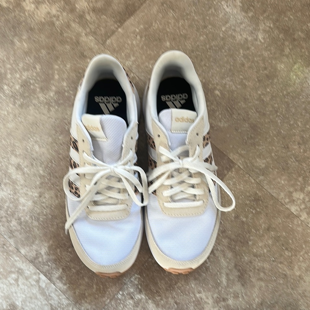 Adidas animal print sneakers.